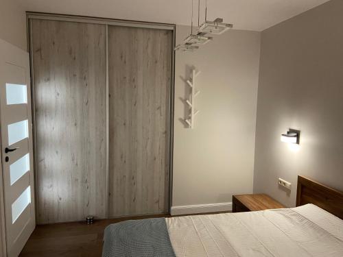 Katil atau katil-katil dalam bilik di Eliana Apartments