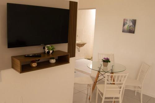 Et tv og/eller underholdning på Casa com lazer completo e WiFi em Aquiraz CE