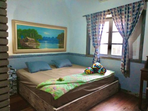 Cama o camas de una habitación en Suíte Explorer