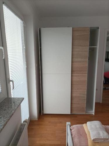 a room with a closet and a door in a room at RELAX in Kamnik