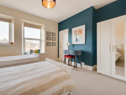 En eller flere senge i et værelse på 3 Bed in Spittal CN168