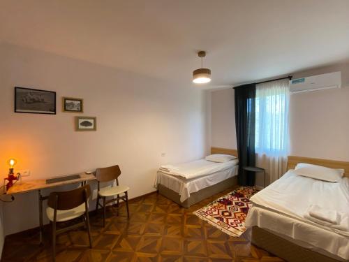 Postel nebo postele na pokoji v ubytování Crossway Camping