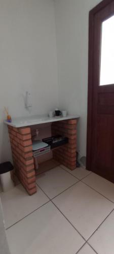 Vonios kambarys apgyvendinimo įstaigoje Os Passarinhos B.I.