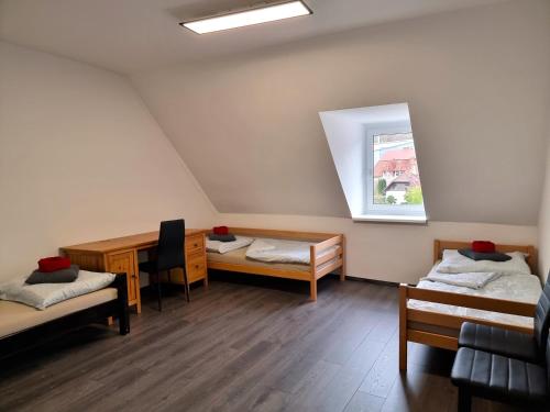 Postel nebo postele na pokoji v ubytování Rentcenter79