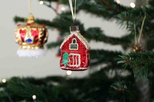 a christmas ornament of a house on a christmas tree at Edenfield House, Springfield, Fife in Cupar