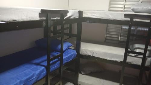 a couple of bunk beds in a room at SP HOSTEL in Sao Paulo