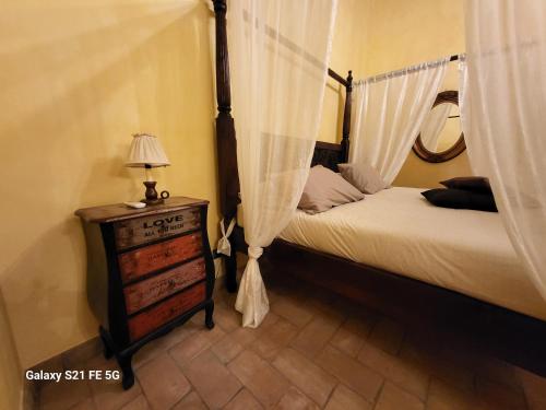 Ένα ή περισσότερα κρεβάτια σε δωμάτιο στο Casale I Pioppi