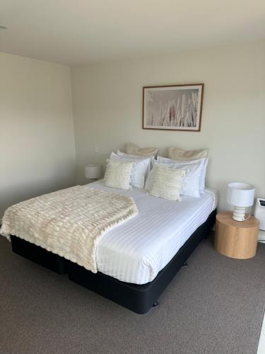 Säng eller sängar i ett rum på Mountain View Escape