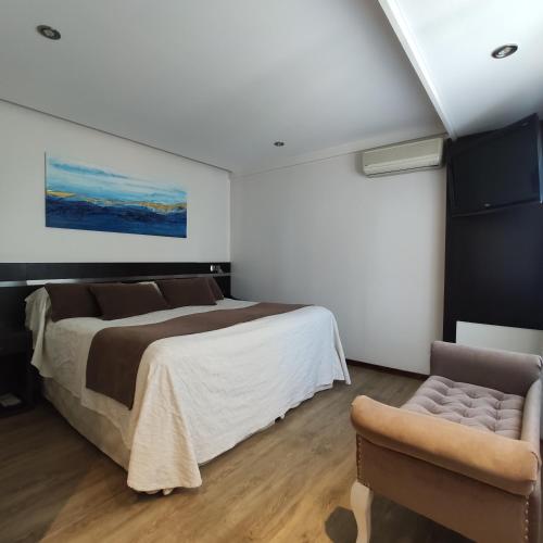 Postel nebo postele na pokoji v ubytování Hotel Nijar