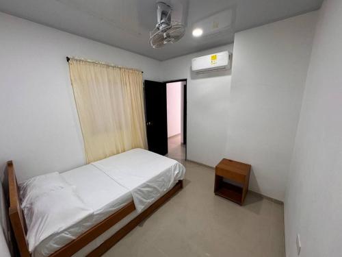 Ένα ή περισσότερα κρεβάτια σε δωμάτιο στο Summer - Apartamento Sector La Coquerita