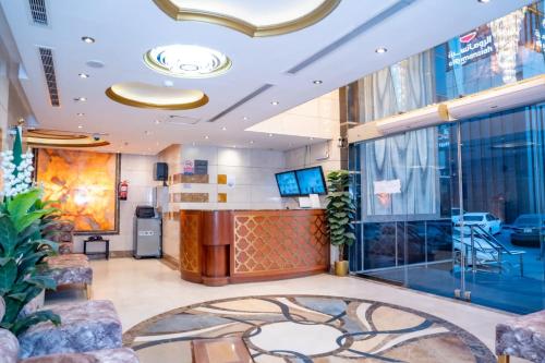 a lobby of a hospital with a waiting area at فندق ليمة الفضية - Leema Al Fadya Hotel in Makkah