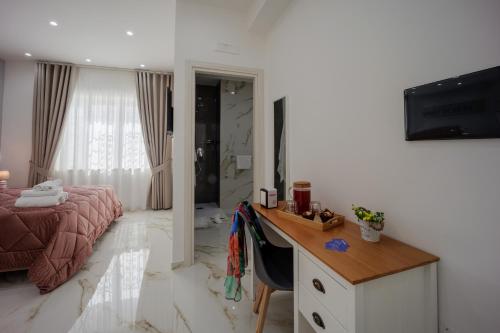 TV a/nebo společenská místnost v ubytování REDDIMUS Guest House