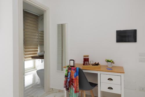 TV a/nebo společenská místnost v ubytování REDDIMUS Guest House