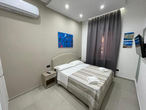 Кровать или кровати в номере Room25mq