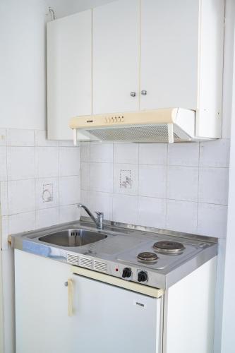 Cuisine ou kitchenette dans l'établissement P i g a d i a B a y