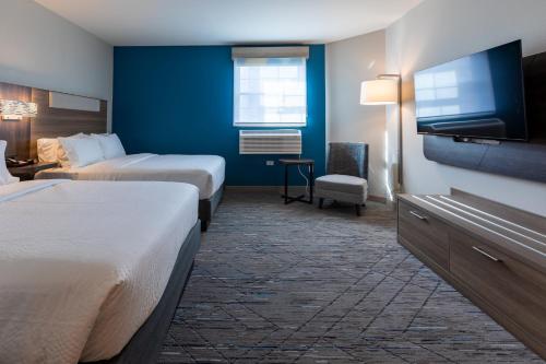 Katil atau katil-katil dalam bilik di Holiday Inn Express & Suites Englewood - Denver South by IHG