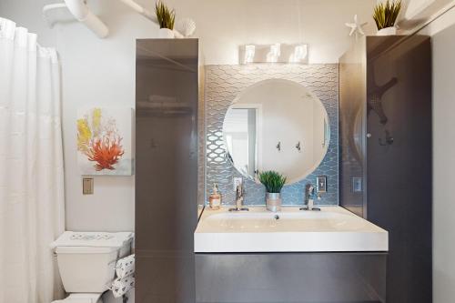 a bathroom with a sink and a mirror at Fontainebleau Terrace 223 in Panama City Beach