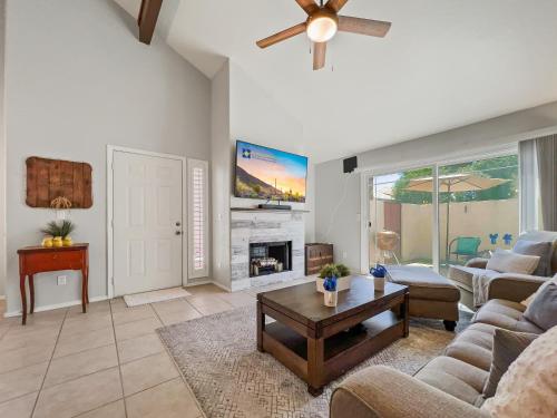 a living room with a couch and a fireplace at Lemon Tree #72 Chandler condo in Chandler