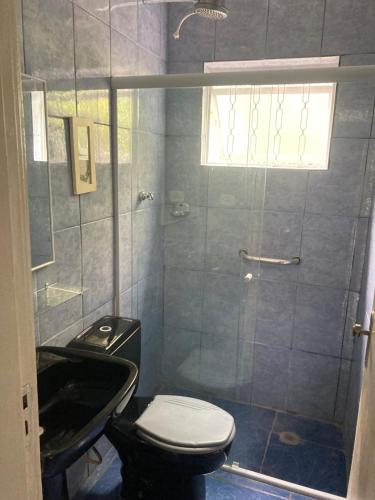 Casa no centro em Ubatuba tesisinde bir banyo