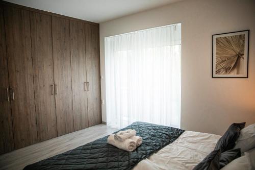 Kinga apartmanにあるベッド