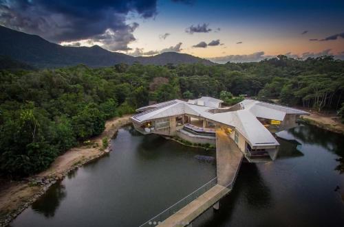 una vista aerea di una casa su un fiume di Alkira Daintree Rainforest Luxury Holiday Home with Private Beach a Cape Tribulation