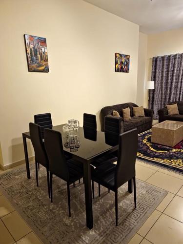 Χώρος καθιστικού στο HOLIDAY HOME in Ajman