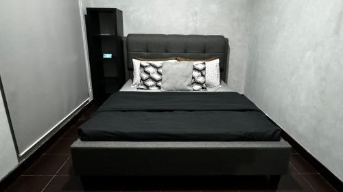 Voodi või voodid majutusasutuse Toby’s Crib at San Lorenzo Place toas