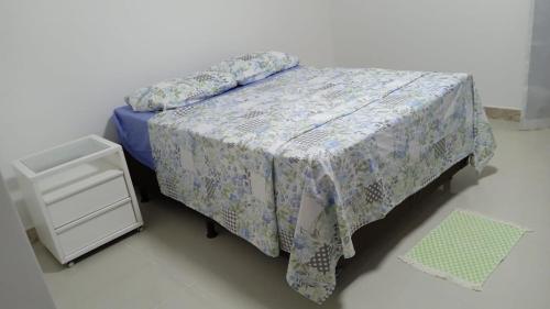 Ένα ή περισσότερα κρεβάτια σε δωμάτιο στο CASA BAHIA - BARRA DO JACUIPE GUARAJUBA