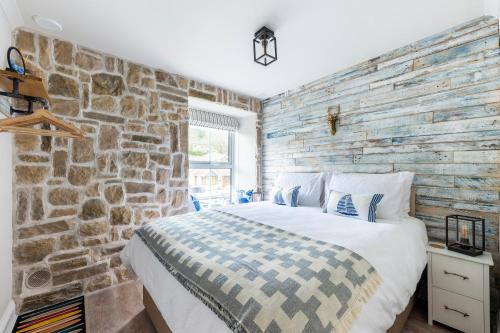 Ένα ή περισσότερα κρεβάτια σε δωμάτιο στο Beachspoke Loft