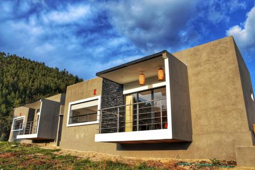 a house on top of a hill at El Encanto Hotel Boutique in Duitama