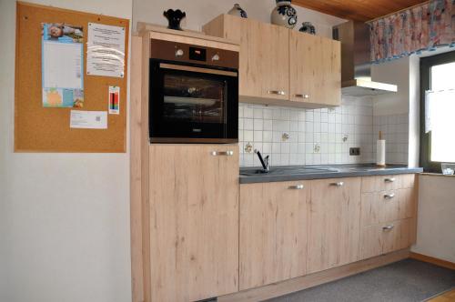 Η κουζίνα ή μικρή κουζίνα στο Ferienwohnung Eudenbach