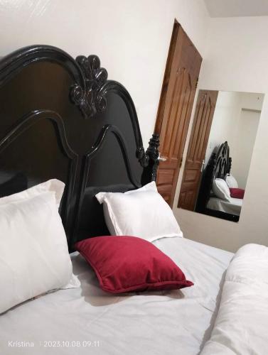 Postel nebo postele na pokoji v ubytování Buruburu Airbnb