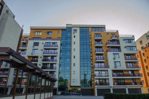 a group of tall buildings in a city at Sophia 2 & Moonlight Apartaments in Mamaia