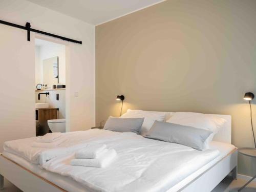 Postel nebo postele na pokoji v ubytování Harlepadd 3b Modern retreat