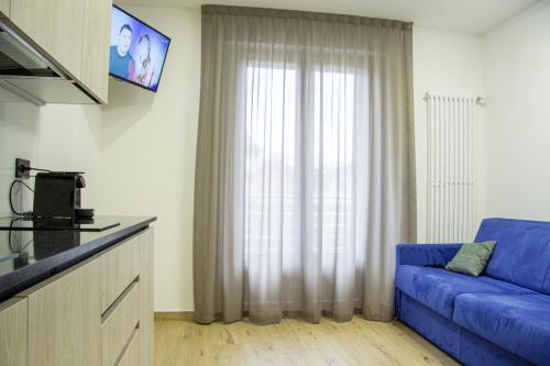 TV a/nebo společenská místnost v ubytování Liz Hotel & Apartments