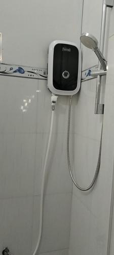 a shower in a bathroom with a shower at Đất Ninh Thuận 2 in Thôn Tân Hội