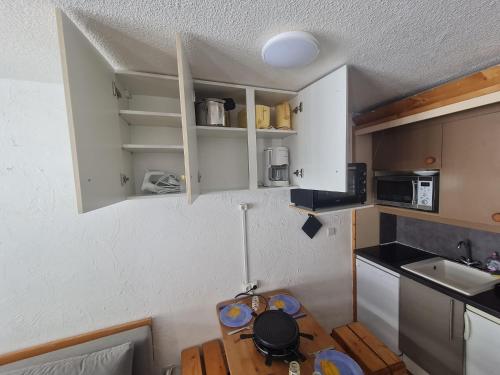 Kuchyň nebo kuchyňský kout v ubytování Appartment val thorens 6 personnes ski in out