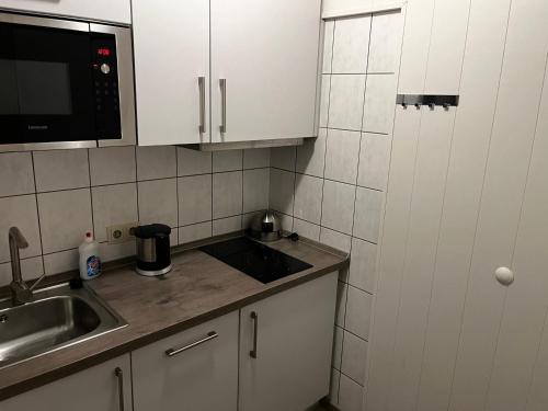 O bucătărie sau chicinetă la Apartment Nordland für 2 Personen 402, 408, 409