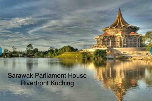 a temple on the water with the words sarawak parliament houseyr important k at Princeton Suite @Kuching Airport in Kuching