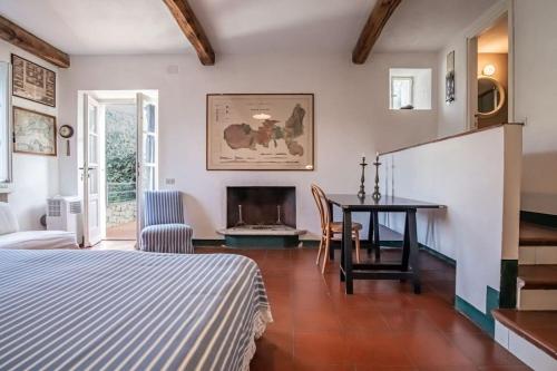 Postel nebo postele na pokoji v ubytování Casale Marciana Marina