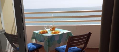 Seafront apartment with pool
