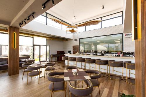 En restaurant eller et andet spisested på Таунхаус в пансионате байтур