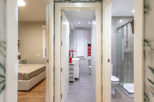 a bathroom with a sink and a toilet in a room at Apartamento en Licenciado Poza in Bilbao