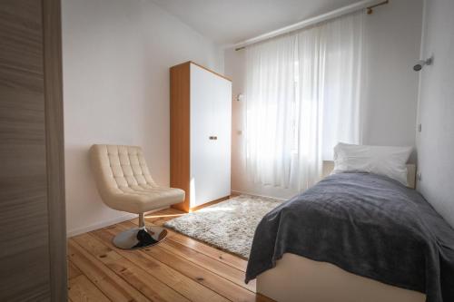 Un pat sau paturi într-o cameră la Villa Luca Christo