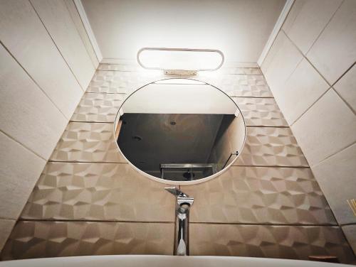 Vonios kambarys apgyvendinimo įstaigoje CostaMare BoutiqueApart-where luxury meets comfort