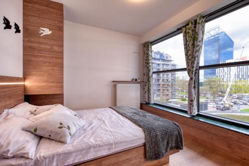 Cama ou camas em um quarto em Apartments3G vol.3
