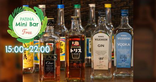 a group of bottles of alcohol on a table at Hotel Patina Ishigakijima in Ishigaki Island