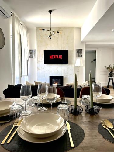 En restaurant eller et spisested på Domus Traiano - Luxury Port Apartment