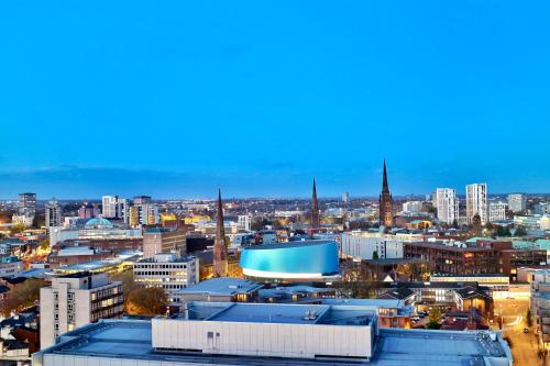 a view of the city of edinburgh with its buildings at Awesome Coventry Home from Home for Business Contractors and Suitable for families with Free WI-FI Free Parking in Coventry
