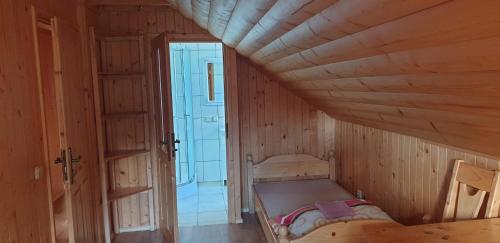 Postel nebo postele na pokoji v ubytování Zátiší na pomezí